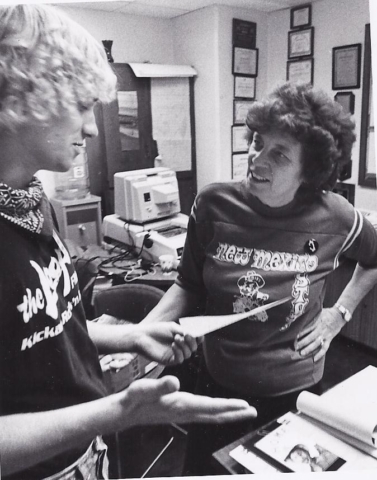 Barbara talking with a student at New Mexico State University.